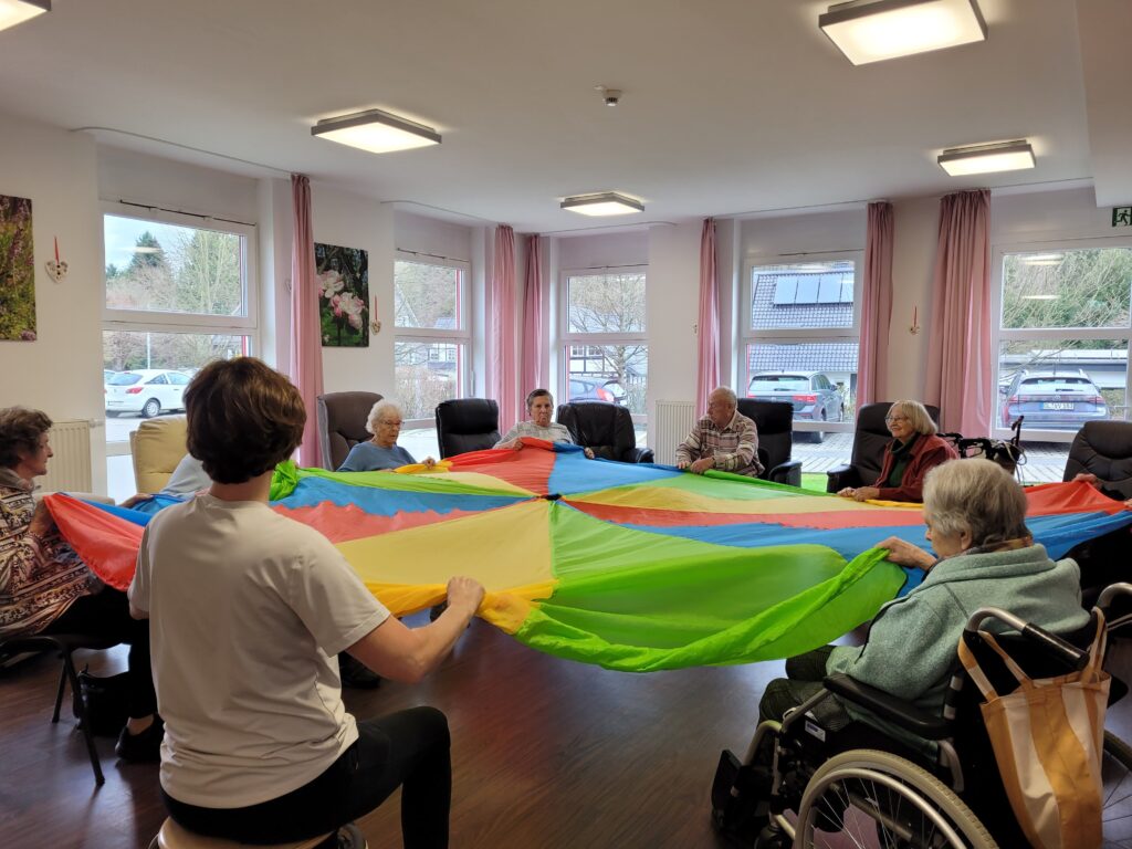 Schwungtuch: Koordination, Freude und Reaktion